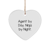 Funny Agent Gifts from Friends - Heart Ornament with 'Agent By Day. Ninja By Night.' Quote for Christmas - Image 1